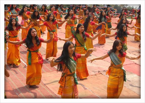 A group of girls performing the Bagurumba dance wearing traditional attires